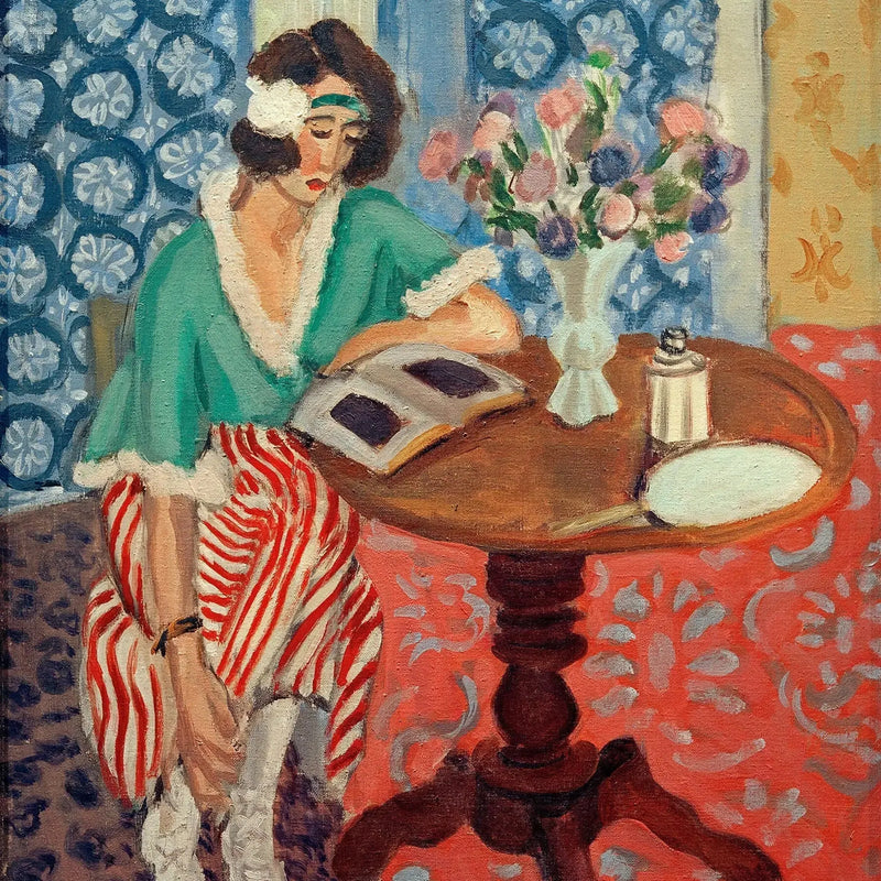 قارئة على طاولة جانبية - هنري ماتيس